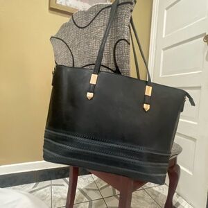 Elegant Black Tote Bag little damage to the handles good condition